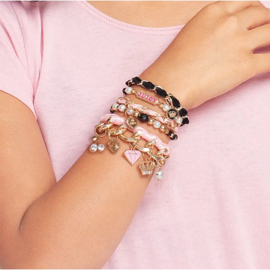 سلاسل وقلادات صغيرة من Juicy Couture سلاسل وقلادات صغيرة من Juicy Couture