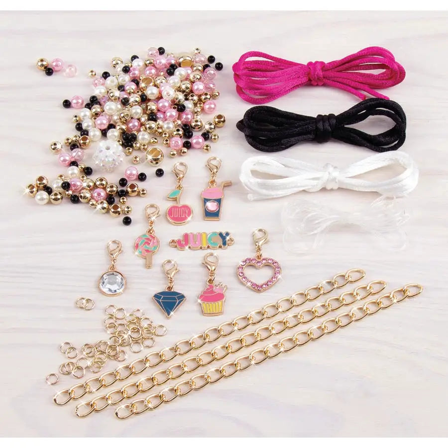 أساور صغيرة باللون الوردي والثمين من Juicy Couture أساور صغيرة باللون الوردي والثمين من Juicy Couture
