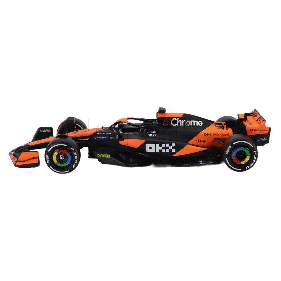 Bburago F1 Miami Grand Prix Mclaren Oscar Piastri Die-Cast Car With Figure (Orange/Black)